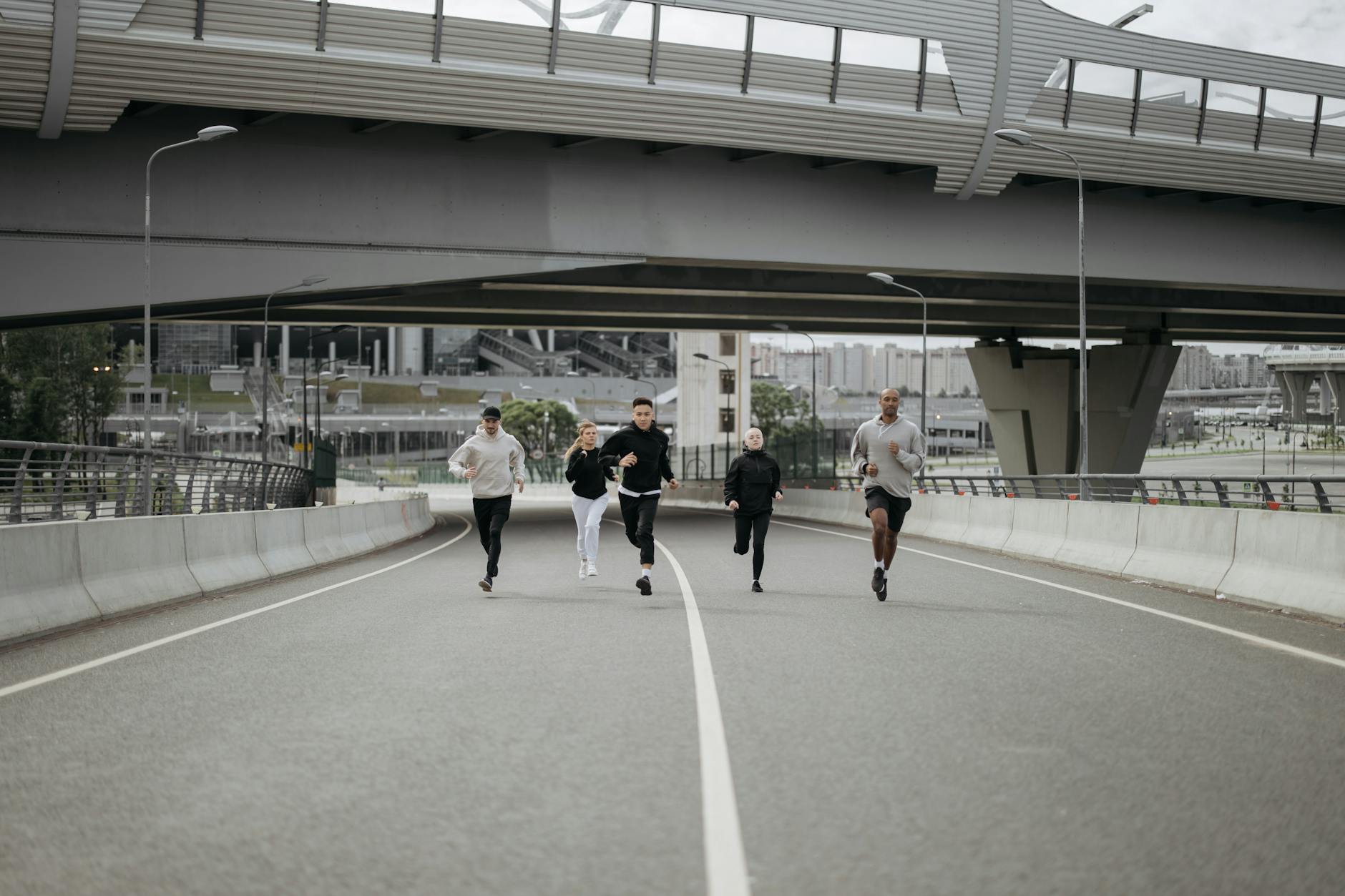 https://www.pexels.com/photo/people-running-on-the-road-5319502/